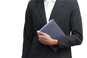 business man holding a book on white background photo