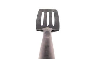 black flipper used in frying. photo