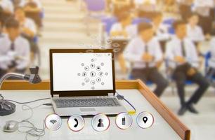 businessman marketing social network future transportation education learning. concept connect computer communicate technology with blur classroom desktop computer background and copy space add text photo