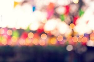 Party bokeh at night market festival,abstract blur image background photo