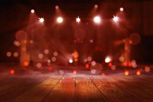 top wood desk with light bokeh in concert blur background,wooden table photo