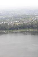 photo of a lake with wide waters, during the day