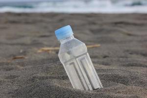 photo of a plain used bottle with daylight