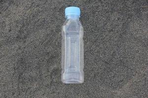 photo of a plain used bottle with daylight