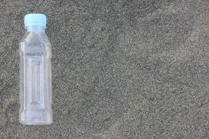 photo of a plain used bottle with daylight