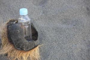 photo of a plain used bottle with daylight