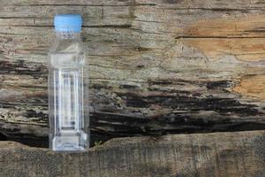 photo of a plain used bottle with daylight