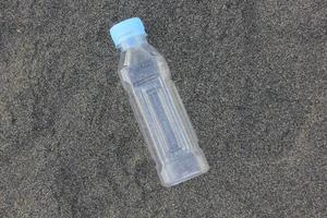 photo of a plain used bottle with daylight