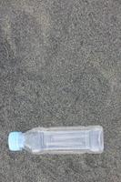 photo of a plain used bottle with daylight