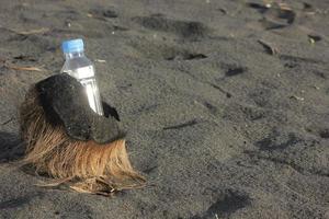 photo of a plain used bottle with daylight