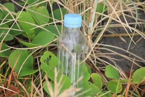 photo of a plain used bottle with daylight