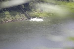 photo of a lake with wide waters, during the day