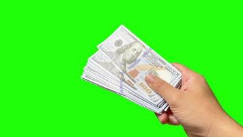 dinero, verde pantalla, mano participación dinero, dólar facturas, financiero verde pantalla video