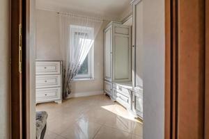 empty corridor in interior of entrance hall of modern apartments photo