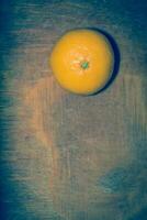 Orange on a Cutting Board Retro photo