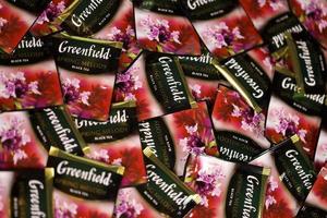 KHARKOV, UKRAINE - DECEMBER 8, 2020 Greenfield Spring Melody tea bags. Greenfield manufactured by Orimi Trade and Greenfield Tea ltd. photo