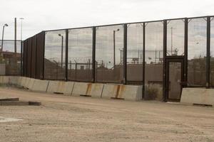 El Paso, Texas, USA September 29, 2022 Border Wall along the US Mexico Border near Downtown El Paso photo