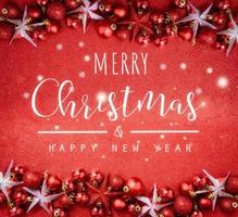 Christmas and New Year typographical on red background with Red glitter texture photo