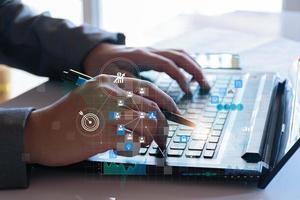 Business database analysis concept. Businessman analyzing economic data. related to business operations, analysis of future economic trends, virtual screens, business networking, internet technology. photo