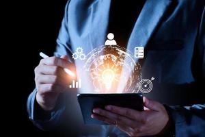 Businessman using mobile smartphone on global network connection on investor and customer with sale data exchange and development of business. Technology and digital marketing. Financial and banking. photo