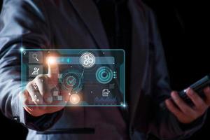 Business database analysis concept. Businessman analyzing economic data. related to business operations, analysis of future economic trends, virtual screens, business networking, internet technology. photo