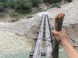 Point of view of a hiker in the Alps photo