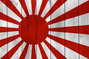 bandera imperial de la marina japonesa sobre un fondo texturizado. collage de conceptos foto