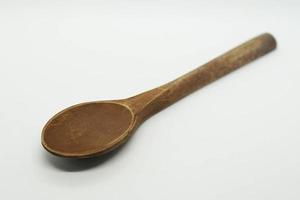 wooden spoon with a white background. photo