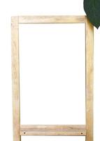 Empty board, chalk board, wooden frame stand sign with a green leaf , isolated, white background, cutout with clipping path photo