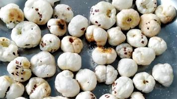 Roasted Taal Makhana Namkeen or Fox Seed, which is a part of Lotus Flower. Served in a bowl. Selective focus photo