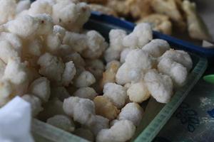 Geblek or cenolan is a traditional food from salaman, Magelang, made from tapioca flour and seasoned with savory fried photo