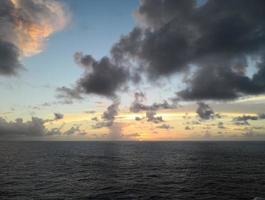 Marine.  Sunset sky and steel clouds photo