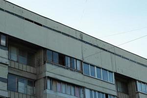 Typical Soviet or Eastern European architecture. Residential buildings with windows photo