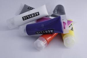 Colorful acrylic paints in tubes photo
