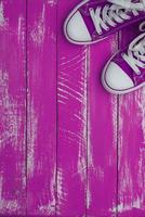 Vertical background with sneakers color purple photo