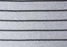 fragment of a cotton and fabric with black stripes photo