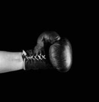 boxing glove dressed on man's hand photo