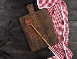 Empty very old wooden kitchen cutting board photo