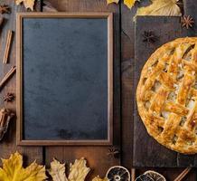 black chalk board and baked whole fruit cake photo