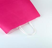 pink paper shopping bag with a handle photo