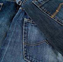 various blue jeans, back pocket photo