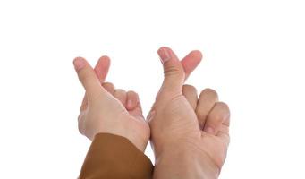 Woman and man hands making a mini heart shape on a white isolated background photo