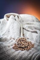 raw lentils over spoon and woolen photo