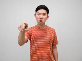 Asian man orange striped shirt angry emotion point finger at you isolated photo