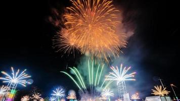 fireworks over the temple in the dark sky photo