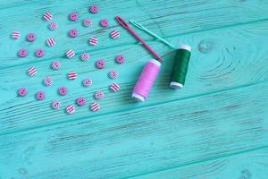 Sewing set on wooden table, copy space photo