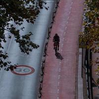 cyclist on the street, bicycle mode of transportation in Bilbao city, spain photo