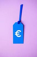 euro sign on the blue price tag for sales photo