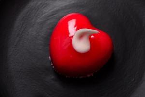 Beautiful tasty cake red color cheesecake in the shape of a heart photo