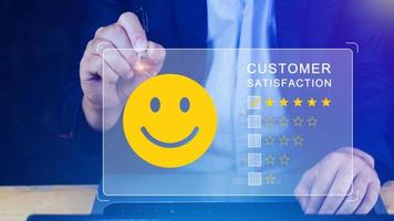 User gives rating to service experience on online application, Customer review satisfaction feedback survey concept, Customer can evaluate quality of service leading to reputation ranking of business. photo